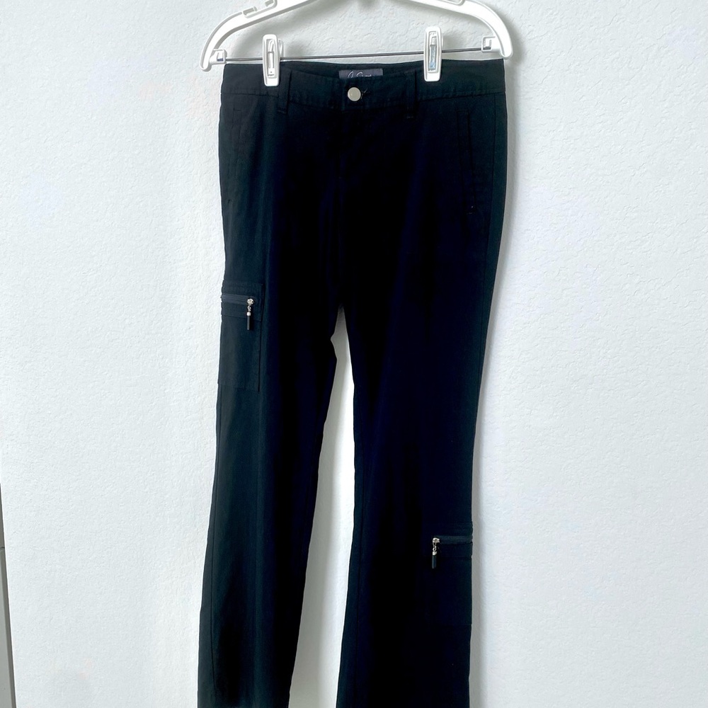 This cute black utility pants with plenty of pockets, 2 with zipper at front.